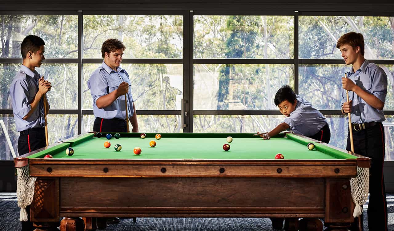 Students Playing Billiards at The King's Boarding School