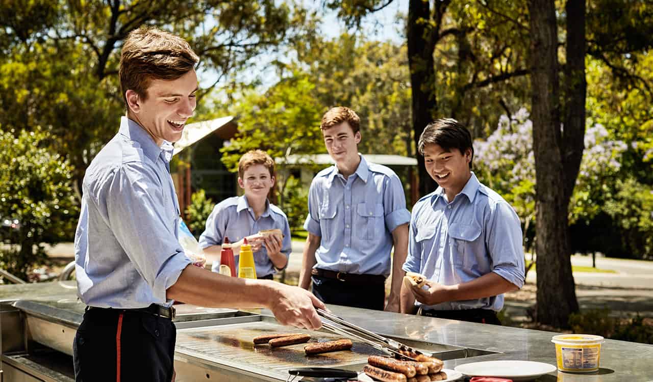 The King's Boarding School Students Enjoying Outdoor BBQ