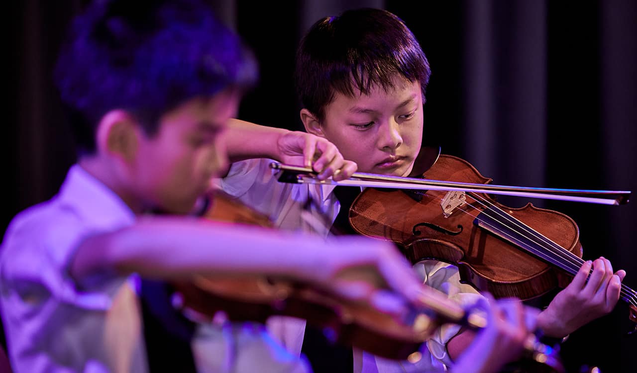 The King's The Preparatory School Students Playing The Violin