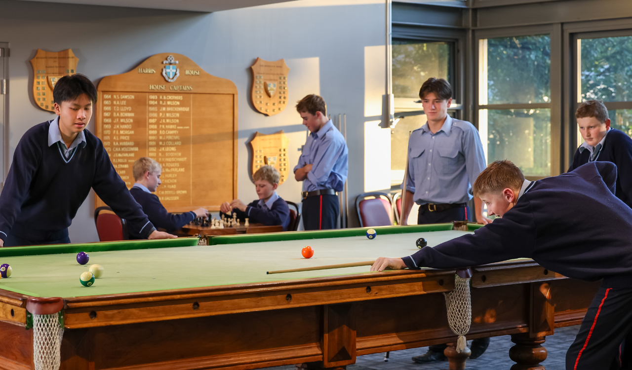 Boys playing pool