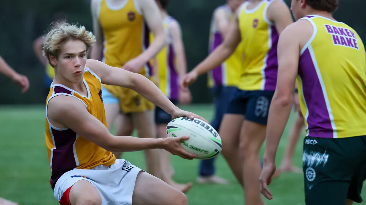 Boys playing rugby
