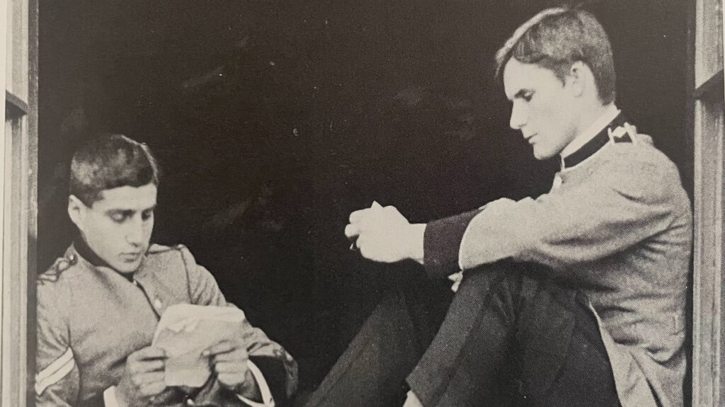 Alan David Mitchell (left)